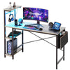 Bestier 52 Inch Gaming Computer Desk with LED Lights Reversible Corner Desk with Shelves in Grey